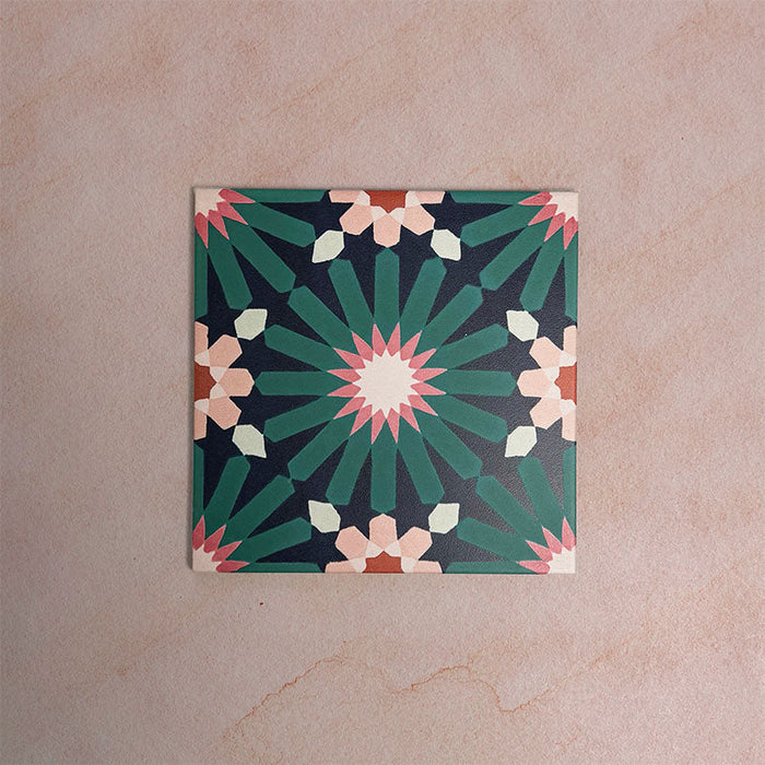Single Fizaan Festive Blue 20x20cm Moroccan-style porcelain tile featuring an intricate geometric pattern in blue, green and soft neutral tones.
