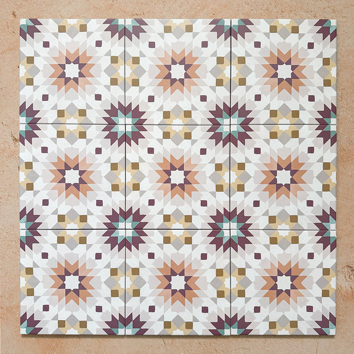 Cabana Manzanillo 20x20cm Moroccan-style porcelain tiles arranged in a repeating geometric star pattern featuring blush pink, mustard, terracotta, lilac, and turquoise tones with a matt finish on a neutral background