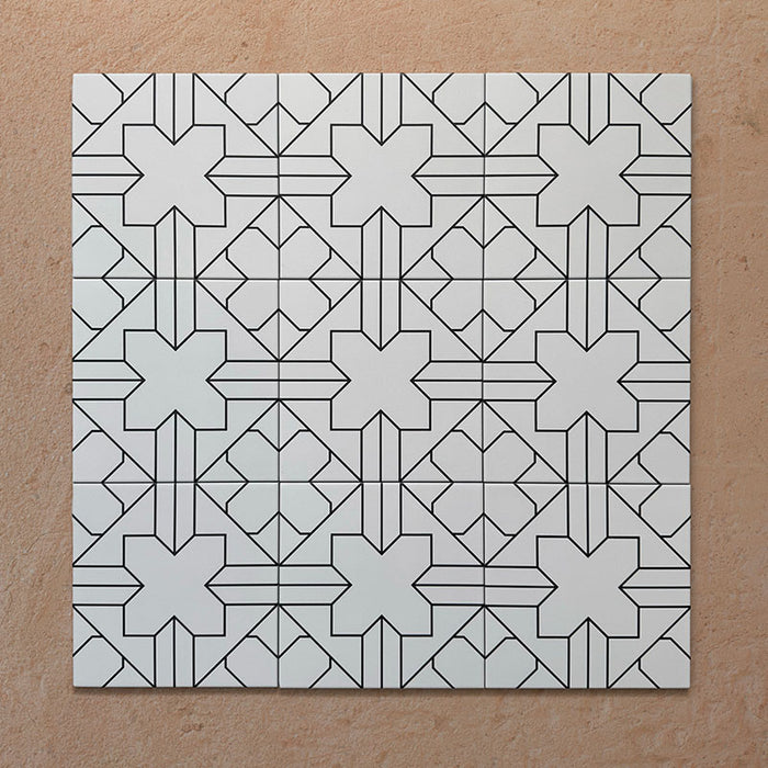 Disposición agrupada de azulejos de estilo marroquí Alhambra Palacio 20x20 cm, con refinado patrón geométrico en cruz en negro sobre fondo blanco definido para un estilo elegante y atemporal.