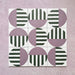 Group image showing multiple Geometry Seritina 20x20cm patterned tiles arranged in a repeating layout, featuring green striped semicircles and mauve solid semicircles on a cream base, photographed against a textured pink background.