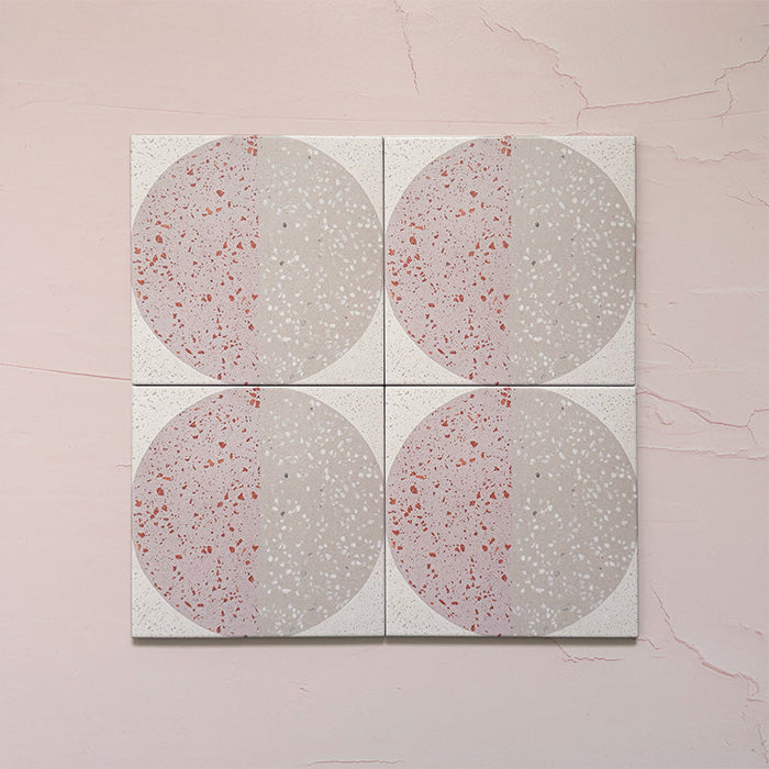 Kasuf Rose 20x20cm terrazzo-style decor tiles featuring a soft pink and neutral circular pattern with speckled terrazzo detailing, ideal for adding a playful yet elegant geometric look to contemporary interiors.