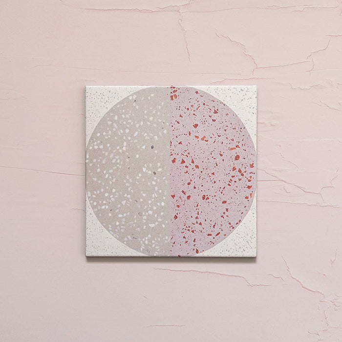 Kasuf Rose 20x20cm terrazzo-style decor tiles featuring a soft pink and neutral circular pattern with speckled terrazzo detailing, ideal for adding a playful yet elegant geometric look to contemporary interiors.