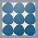 Pebble Beach Reversed Blue 20x20cm patterned tiles featuring a bold deep blue organic circular design, ideal for creating playful statement walls and contemporary patterned floors with a modern geometric feel.