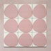Pebble Beach Reversed Pink 20x20cm patterned tiles featuring a soft blush pink organic circular design, perfect for adding a playful yet minimalist look to bathrooms, kitchens, and statement floors.