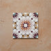 Cabana Manzanillo 20x20cm Moroccan-style porcelain tile featuring an intricate geometric star pattern in blush pink, mustard, terracotta, lilac, and turquoise tones on a soft matt finish background