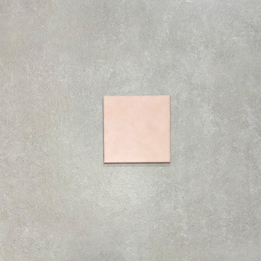 Single Bedouin Mequinez Rose Base 15x15cm Moroccan style porcelain tile with a soft matt pink finish and lightly aged surface detail, ideal for bathroom wall tiles, kitchen splashback tiles, and coordinated patterned floor tile layouts.