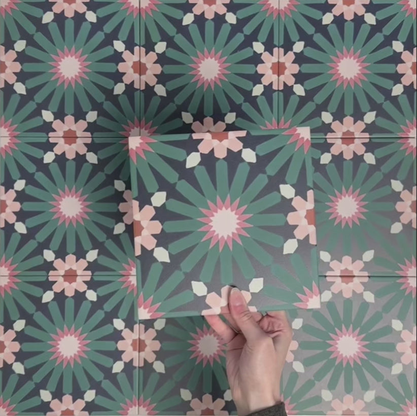 Single Fizaan Festive Blue 20x20cm Moroccan-style porcelain tile featuring an intricate geometric pattern in blue, green and soft neutral tones.