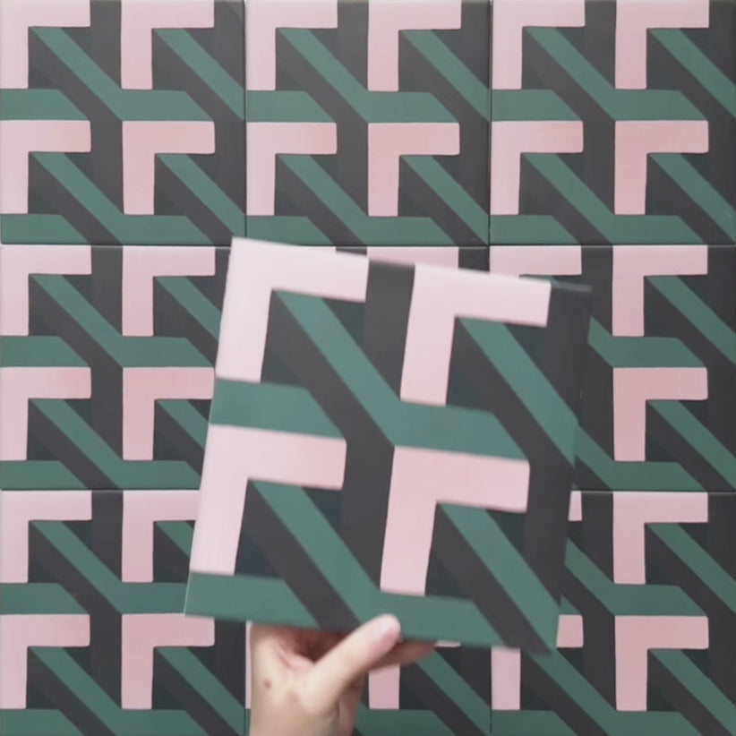 Geometry Lagoon 20x20cm patterned ceramic tile featuring an interlocking geometric design in blush pink, deep teal, and charcoal tones.