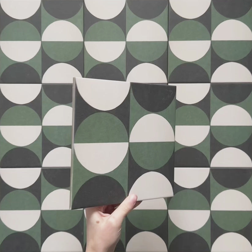 Geometry Circulo 20x20cm geometric patterned tile with green, black, and cream semicircle motifs