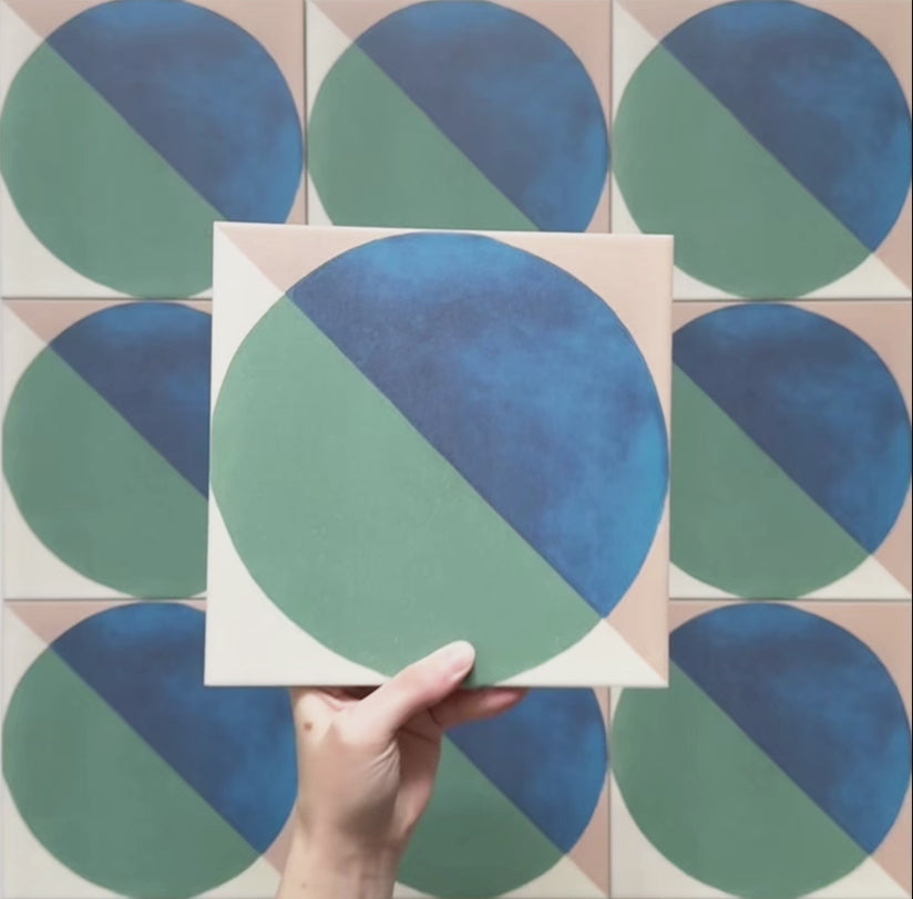  Geometry Ocean 20x20cm geometric patterned tile with blue and green semicircles on a sand and white background.